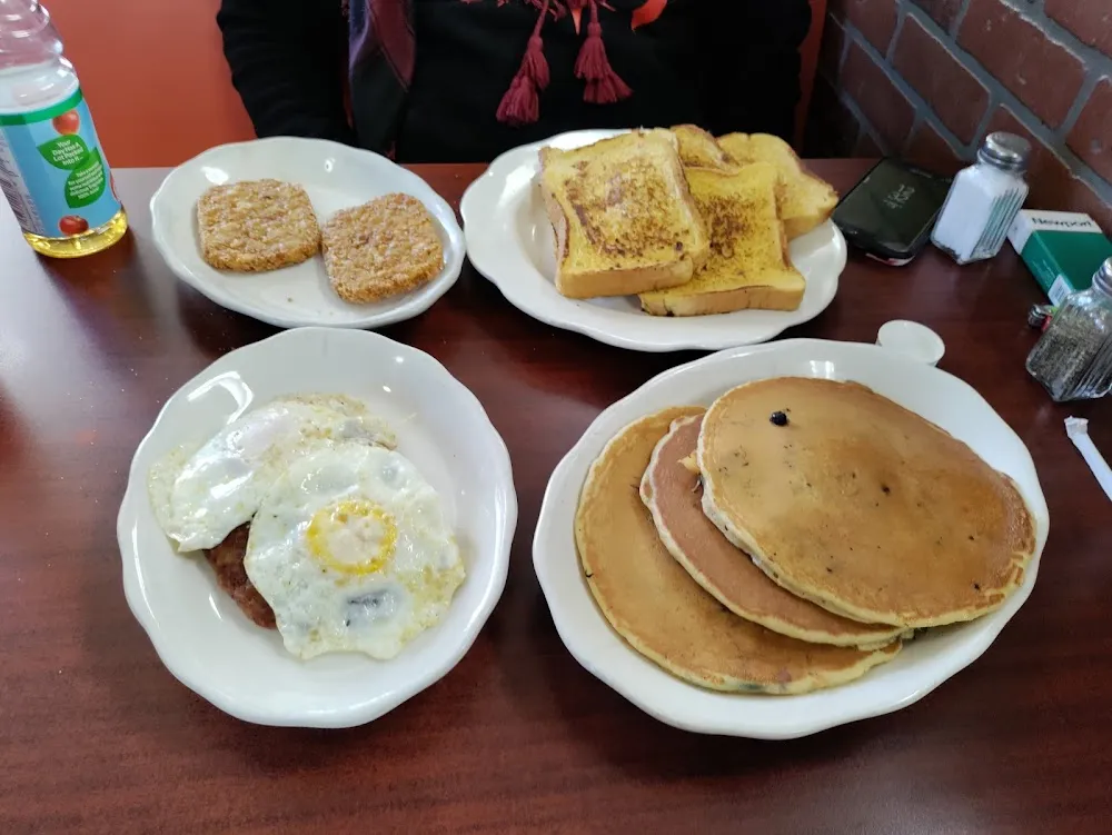Pancakes with Two Eggs and Corned Beef Hash