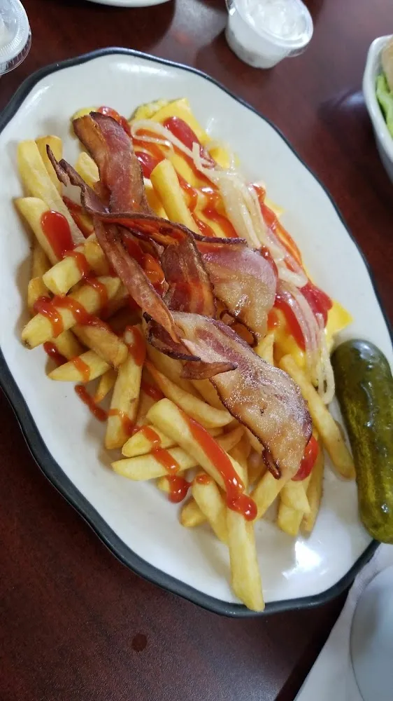 Scrambled Eggs with Cheese Bacon and Frenchfries